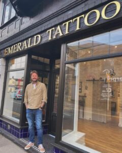 Owner Sam Fisher outside the new Emerald Tattoo Emporium, Pontardawe.