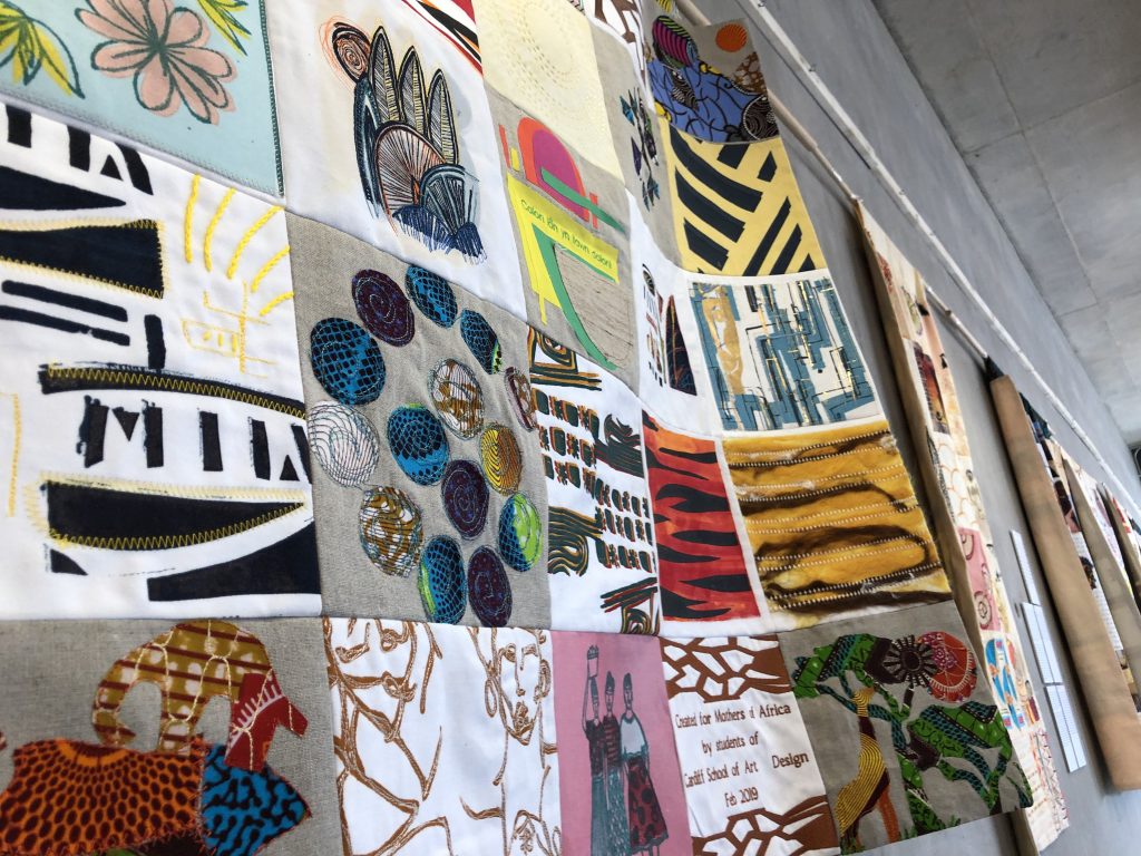 Each student has designed and created a square to support the creation of the quilt