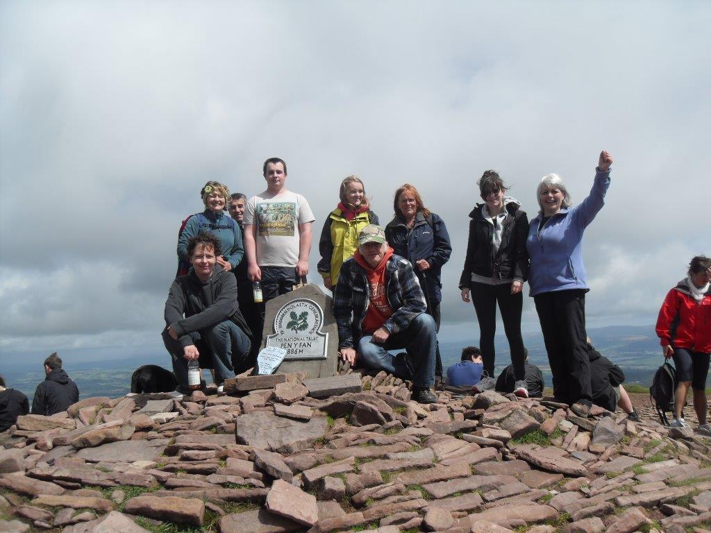 Mountain top meeting facilitated by training company Call of the Wild