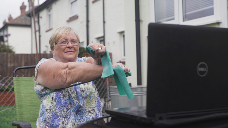 Elderfit classes draw on a variety of techniques, including mobility exercises using resistance bands ©Elderfit