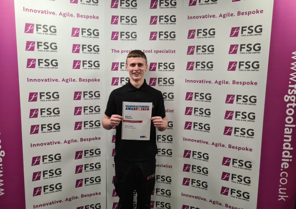 Learner and apprentice Jamie Jones holding his awards certificate