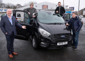 Low-Cost-Vans-Managing-Director-Rod-Lloyd-hands-over-the-keys-of-their-new-van-to-FabFour-Coffees-Shane-Williams-Lee-Byrne-and-James-Hook