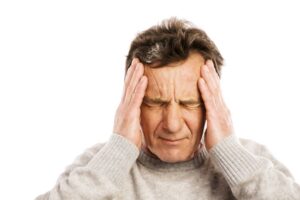 graphicstock-senior-man-has-headache-isolated-on-white-background_HA1tgK3ZZ