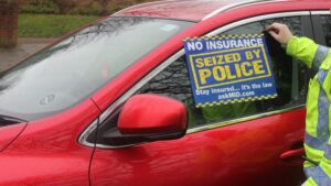 Seized-uninsured-red-car-image-credit-Motor-Insurers-Bureau-MIB-scaled