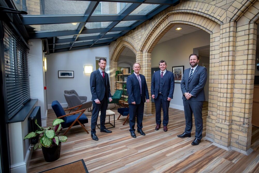 Gamlins-Law-directors-Dafydd-Roberts-Ron-Davison-Sion-Llewelyn-Williams-and-Glyn-Morrice-Evans-at-the-firms-new-office.jpg25-002-scaled