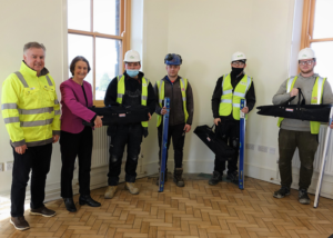 Nia Griffiths MP presents toolkit to Onsite Hub trainee at Llanelli Railway Goods Shed