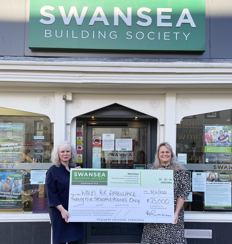 Swansea Building Society’s Sioned Jones presents a cheque to Kate Macro of Wales Air Ambulance Charitable Trust