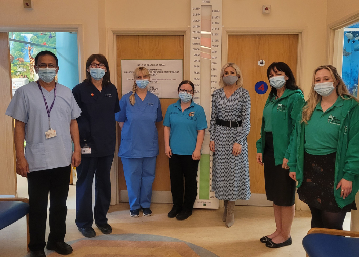 Members of the Popham Kidney Support team, along with charity ambassador, Sian Lloyd (middle, right), and staff at the Children's Kidney Centre.