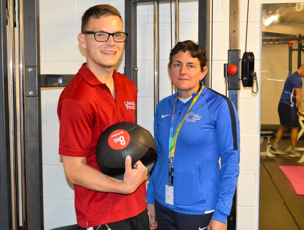 Sporting star with cerebral palsy designs fitness routines for disabled gym users