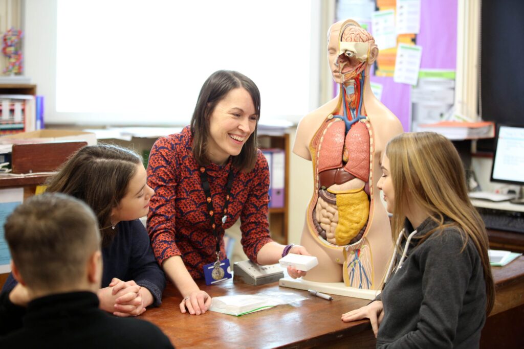 BCUHB representative interacting with pupils