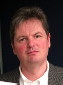 Headshot of Glenn Collins.