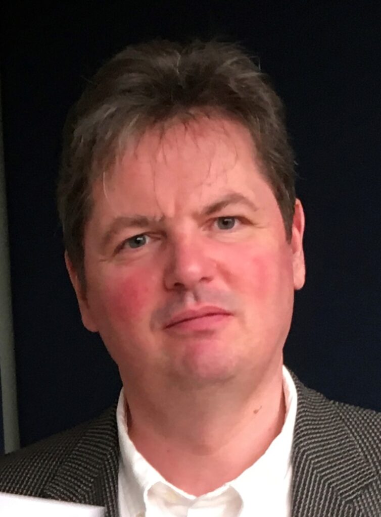 Headshot of Glenn Collins.