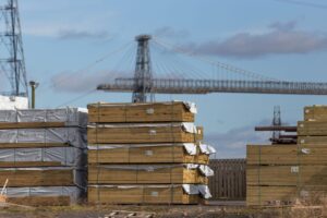 Imported timber at Docks with Transporter Bridge