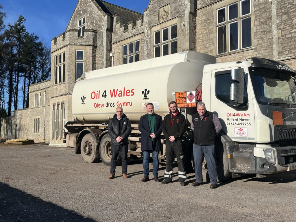 L-R Richard Whittington, technical sales manager - comercial, Baxi, Dough Hughes, Oil4Wales fuel tanker driver Alex Jennings and Oil4Wales sales rep Keving Price (1)