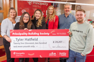 Principality Building Society - Tyler Hatfield with his competition winning cheque, Cardiff, 02/12/2023