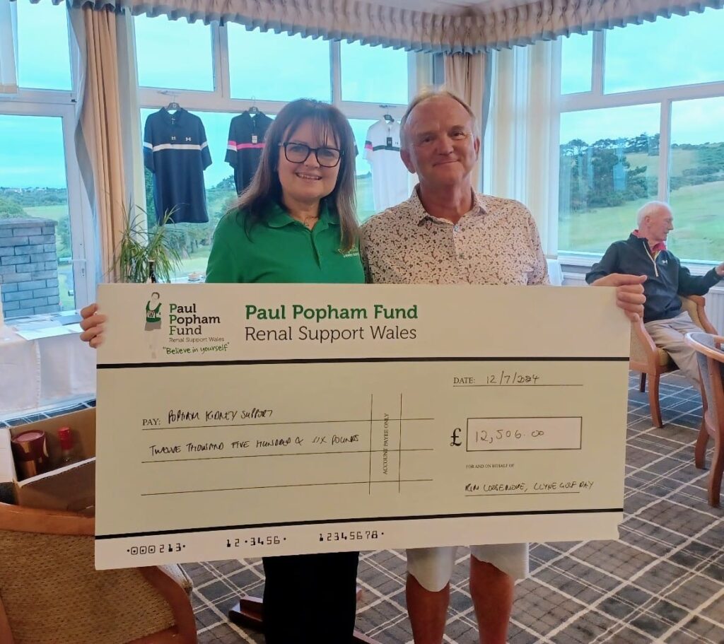 Popham Kidney Support CEO, Joanne Popham with event organiser, Kim Loosmore, holding the cheque of £12,500.