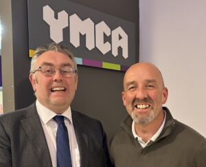 Swansea Building Society's Richard Miles (left) is welcomed to the YMCA Cardiff Board by Andrew Templeton (right) Group Chief Executive at YMCA Cardiff Group.