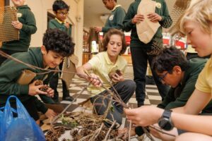 The children used natural materials like sticks and leaves found on-site to create a large bug hotel - Photo credit Huw John