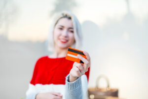 beautiful-young-girl-holding-credit-card