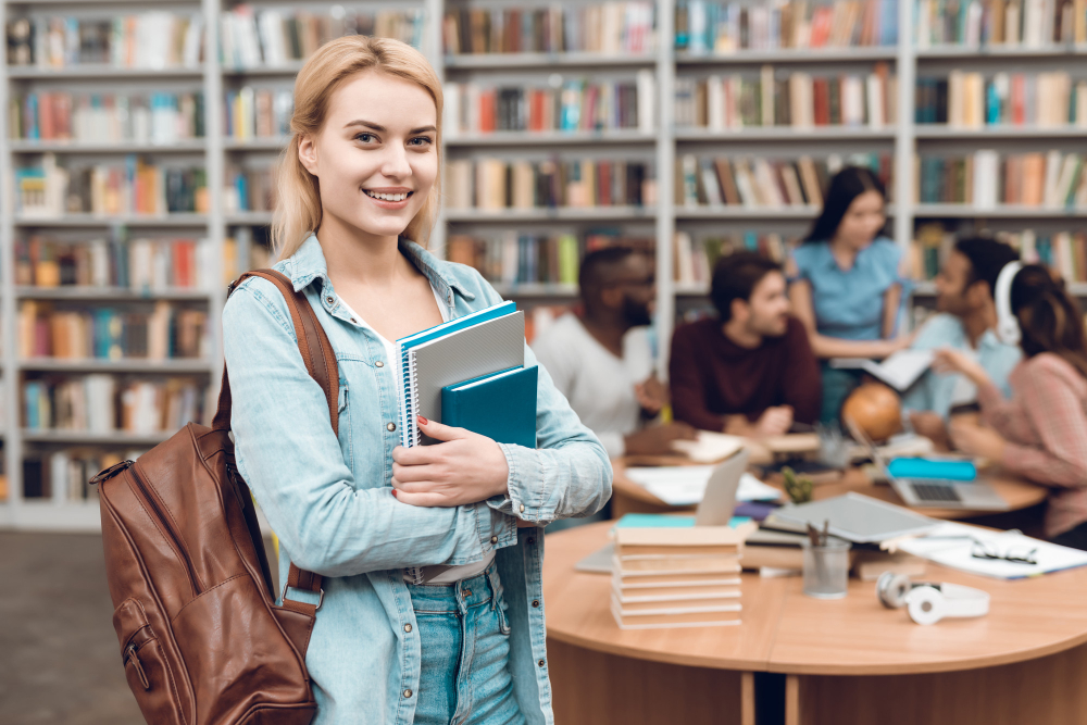 group-ethnic-multicultural-students-sitting-library