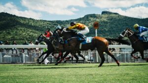 man riding horse in race