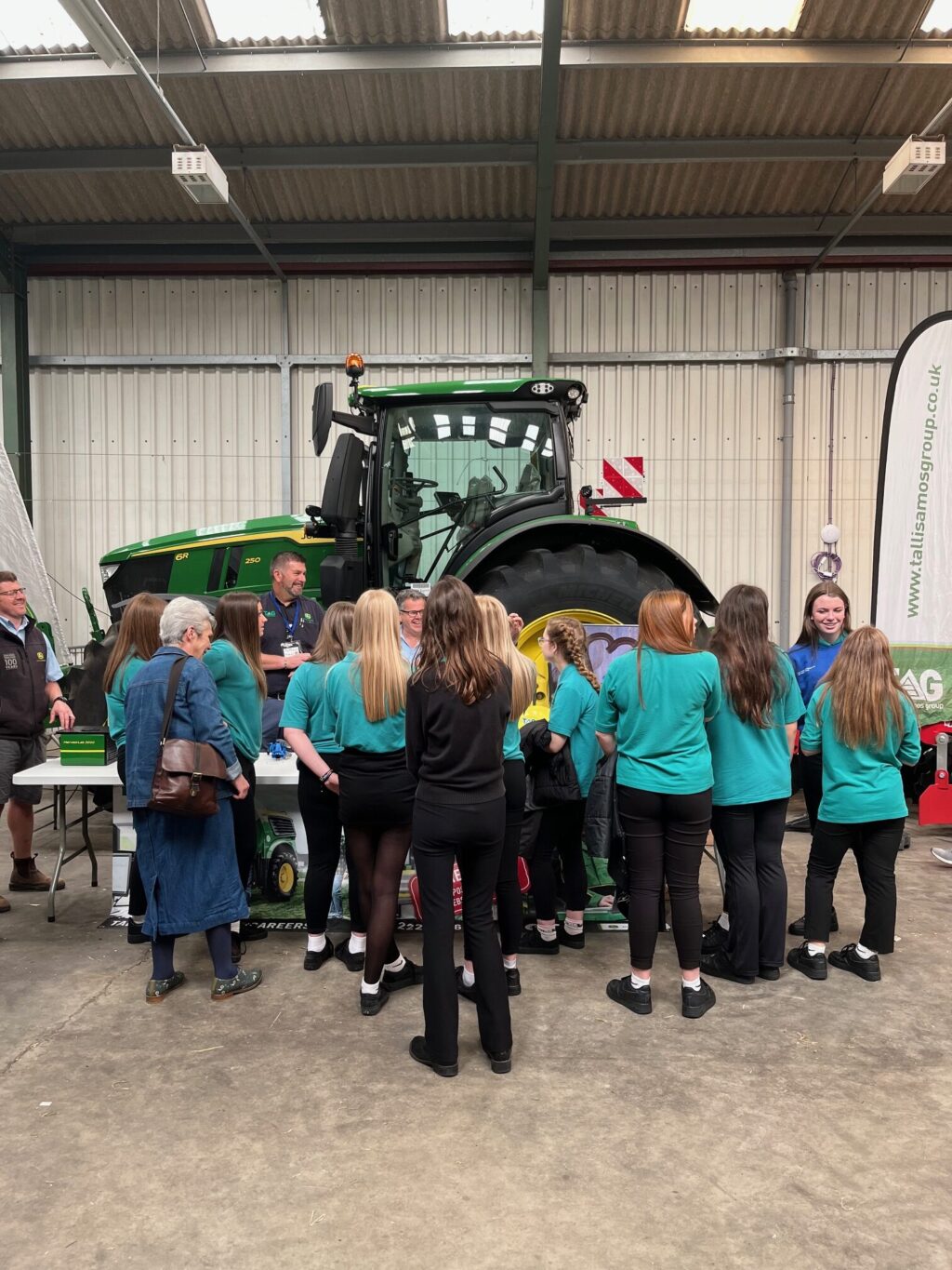 school children learning how machinery is used in food production