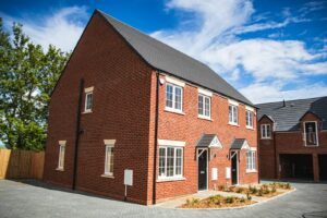 brown brick building under blue sky during daytime